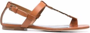Saint Laurent Cassandra logo-strap flat sandals Brown